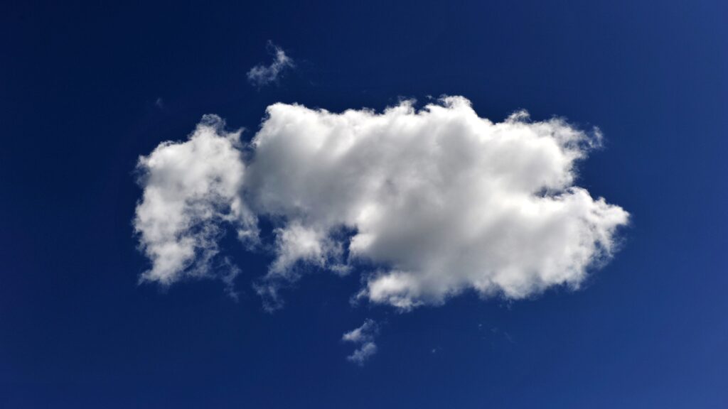 Blue sky with one cloud. Photo.