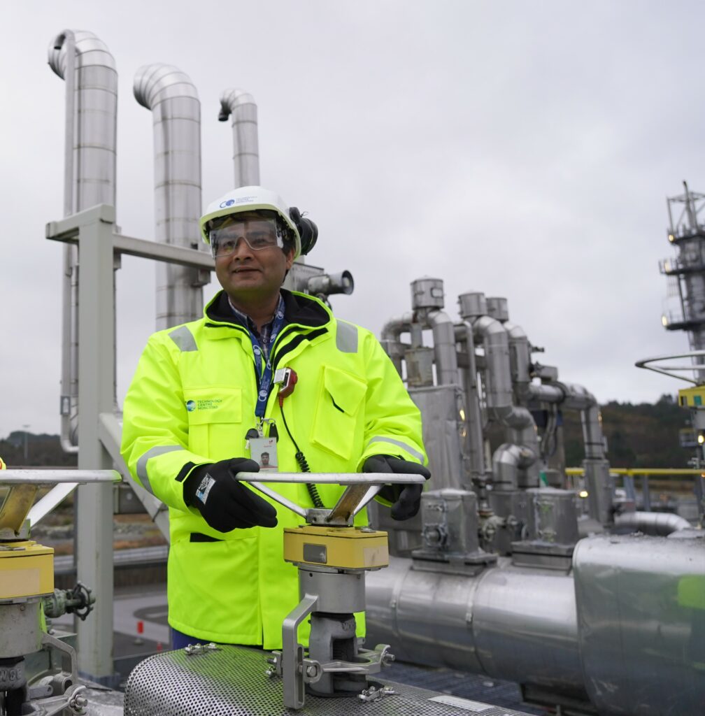 Muhammad Ismail Shah dressed in PPE at the test plant. Photo.